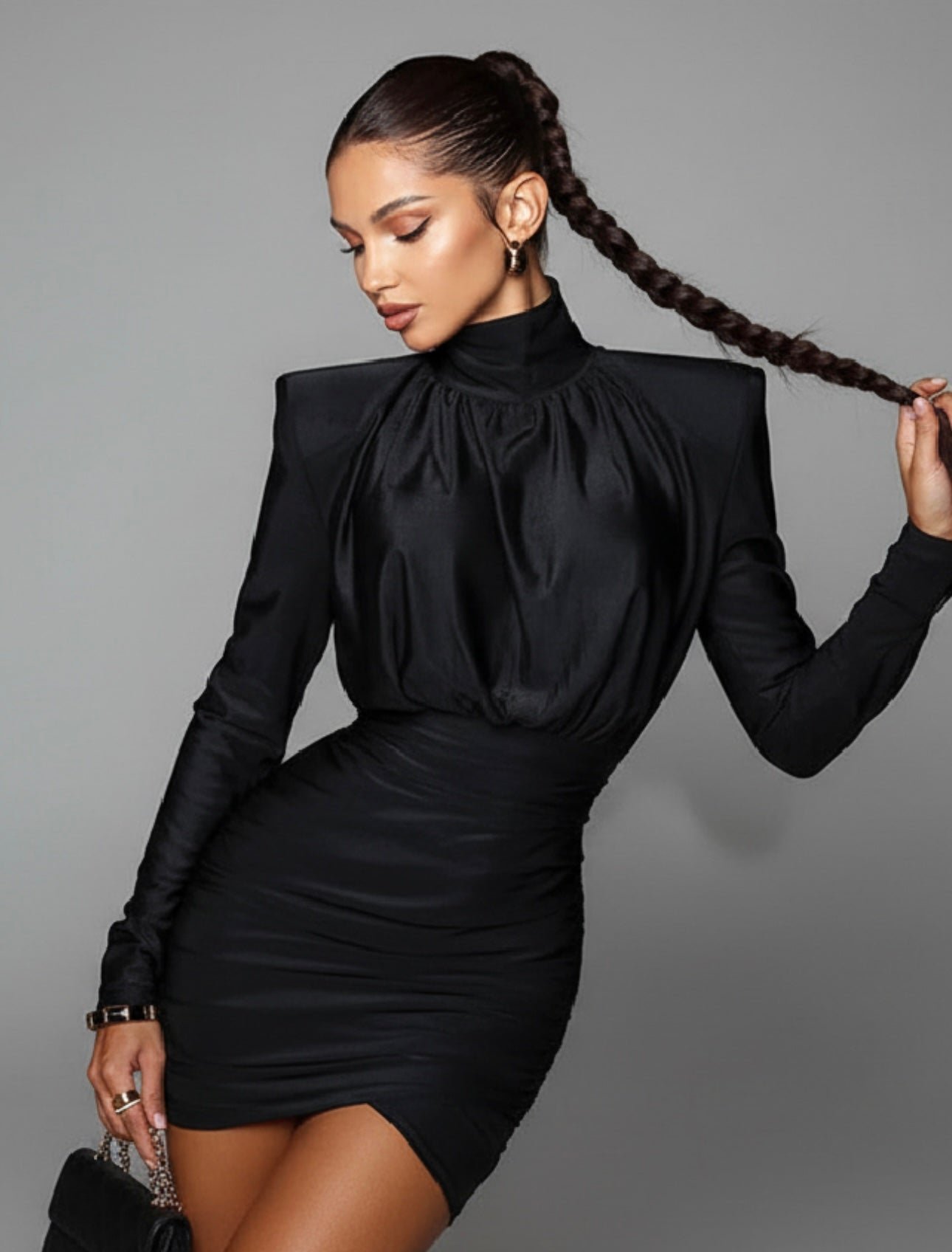 FullSizeRender_d92d0dee-5530-4270-af4f-ef13afb70a5d Elegant Black High-Neck Ruched Mini Dress with Structured Shoulders - 图片 1